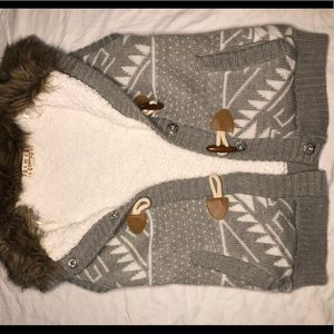 A winter hooded sweater vest